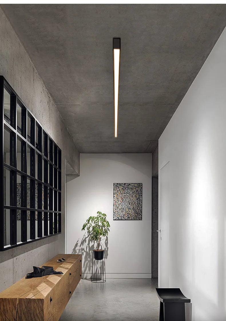 Nordic modern LED ceiling light installed in a contemporary living room with minimalist interior décor.