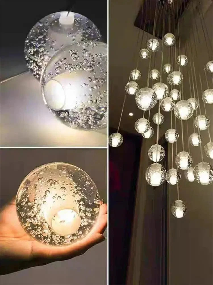 Modern spiral crystal LED chandelier cascading down a luxury staircase in a contemporary home.
