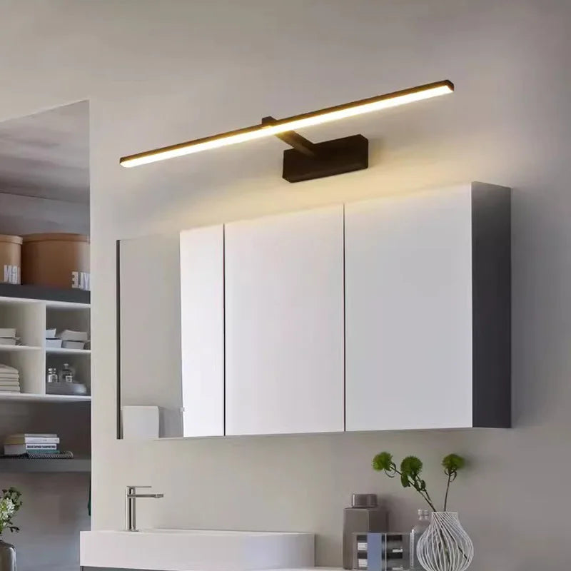 Modern waterproof LED mirror light mounted above a bathroom vanity mirror with bright, even illumination.