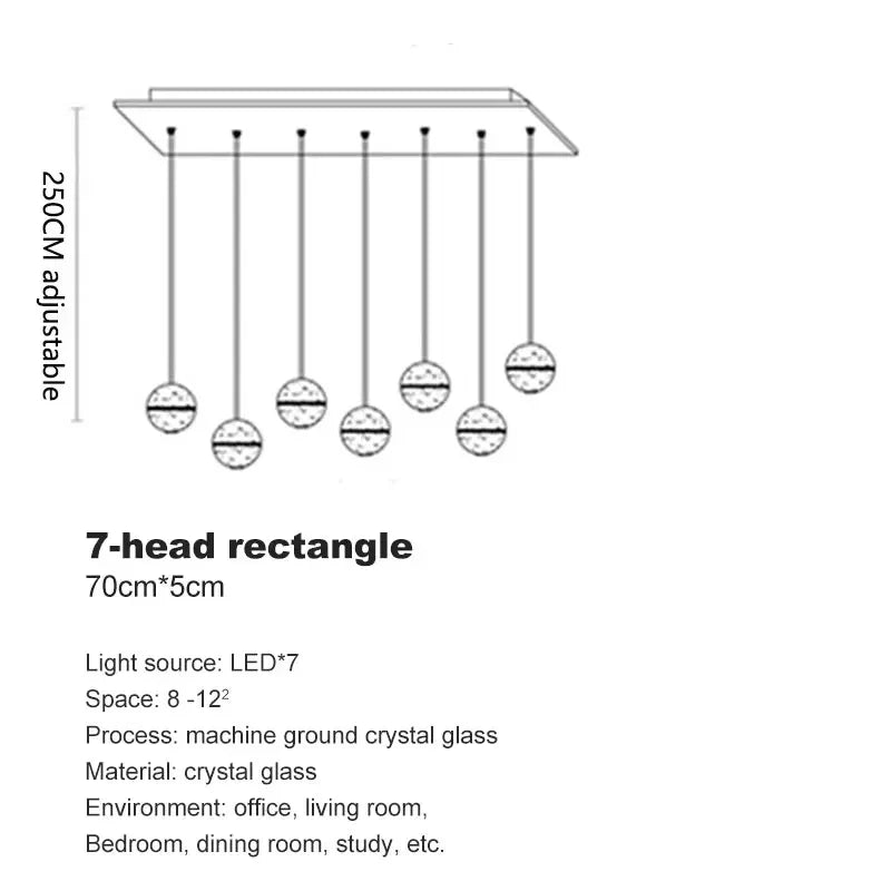 Modern spiral crystal LED chandelier cascading down a luxury staircase in a contemporary home.