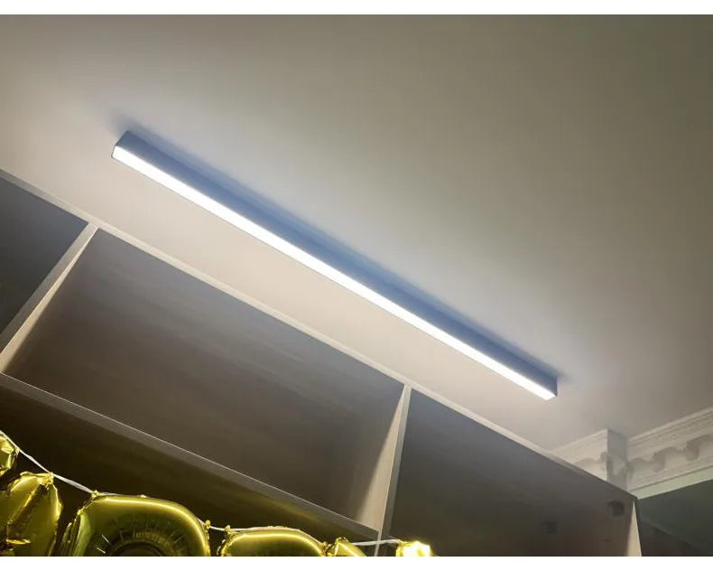 Nordic modern LED ceiling light installed in a contemporary living room with minimalist interior décor.