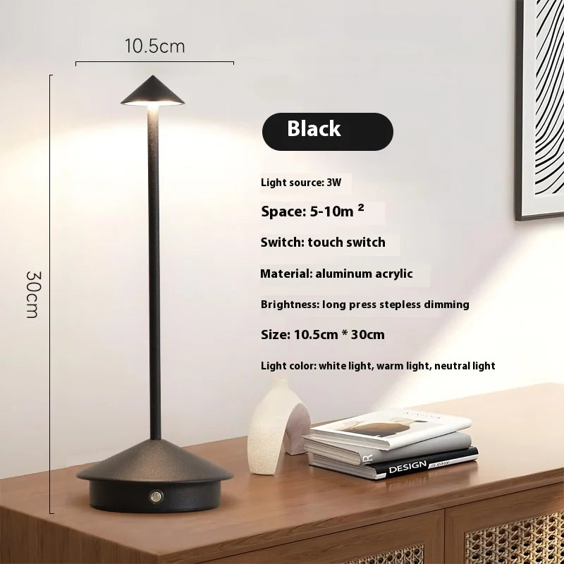 Rechargeable touch LED table lamp placed on a modern dining table in a stylish café-inspired interior.