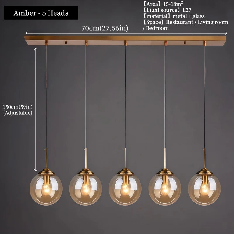 Modern luxury glass LED pendant light hanging above a dining table in a contemporary home.