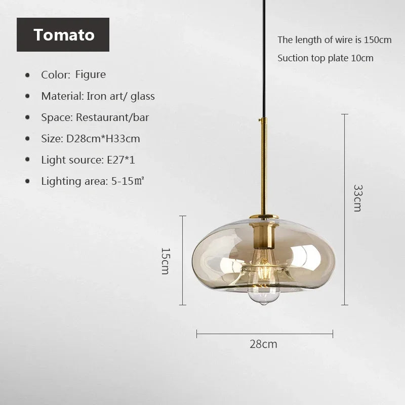 Nordic glass pendant light suspended above a kitchen island in a modern Scandinavian-inspired home.