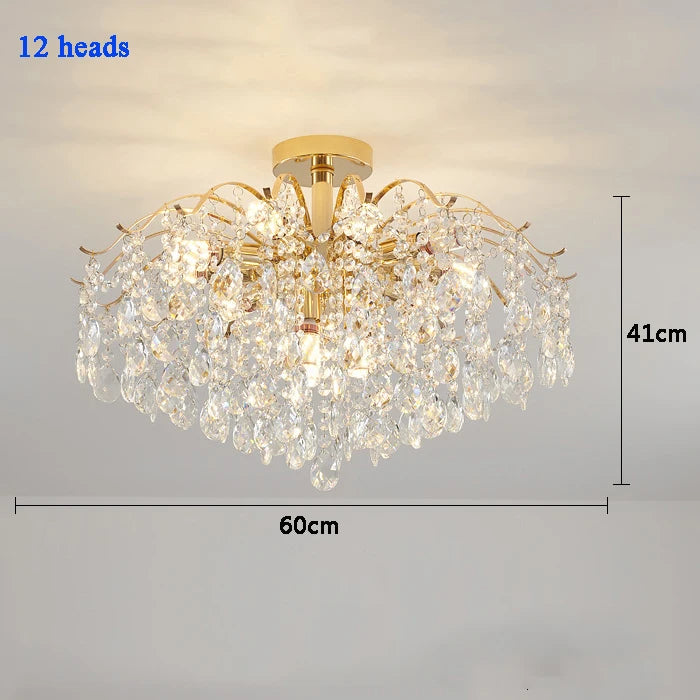 Modern luxury crystal LED chandelier installed in a stylish living room with elegant contemporary décor.