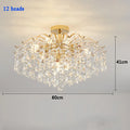 Modern luxury crystal LED chandelier installed in a stylish living room with elegant contemporary décor.