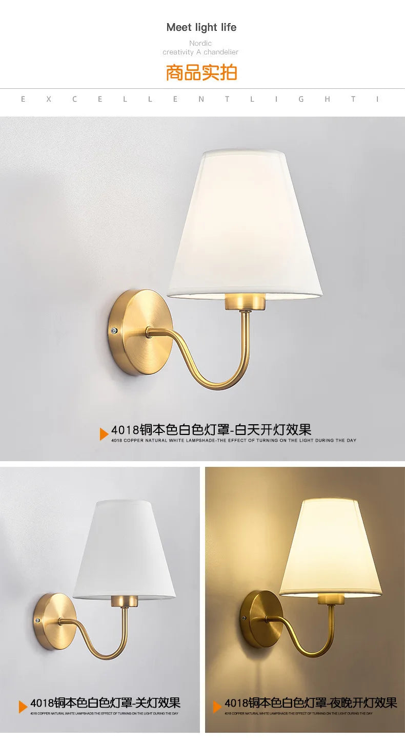Modern fabric wall sconce installed beside a bed in a contemporary bedroom with warm ambient lighting.