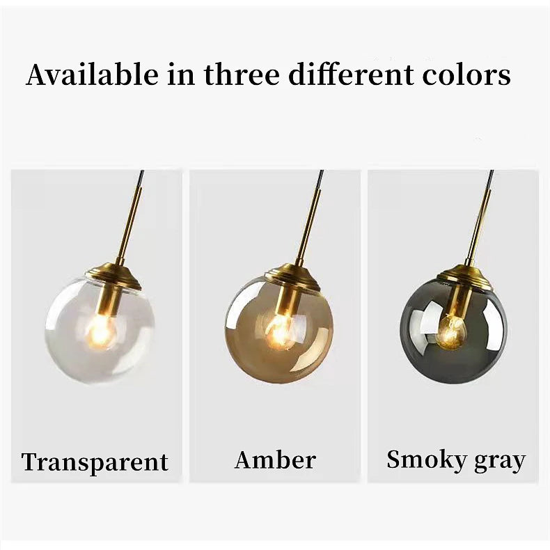 Modern luxury glass LED pendant light hanging above a dining table in a contemporary home.