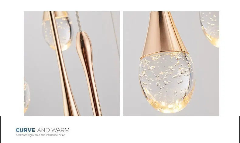 Modern bubble crystal pendant light hanging above a kitchen island in a luxury contemporary home.