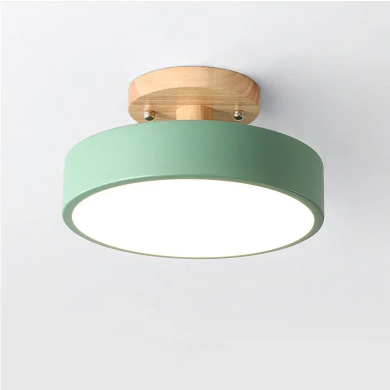 Nordic wood round LED ceiling light installed in a modern hallway with Scandinavian-inspired interior décor.