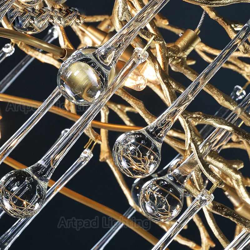 Luxury gold branch crystal chandelier hanging in a modern living room with elegant contemporary décor.