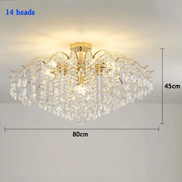 Modern luxury crystal LED chandelier installed in a stylish living room with elegant contemporary décor.