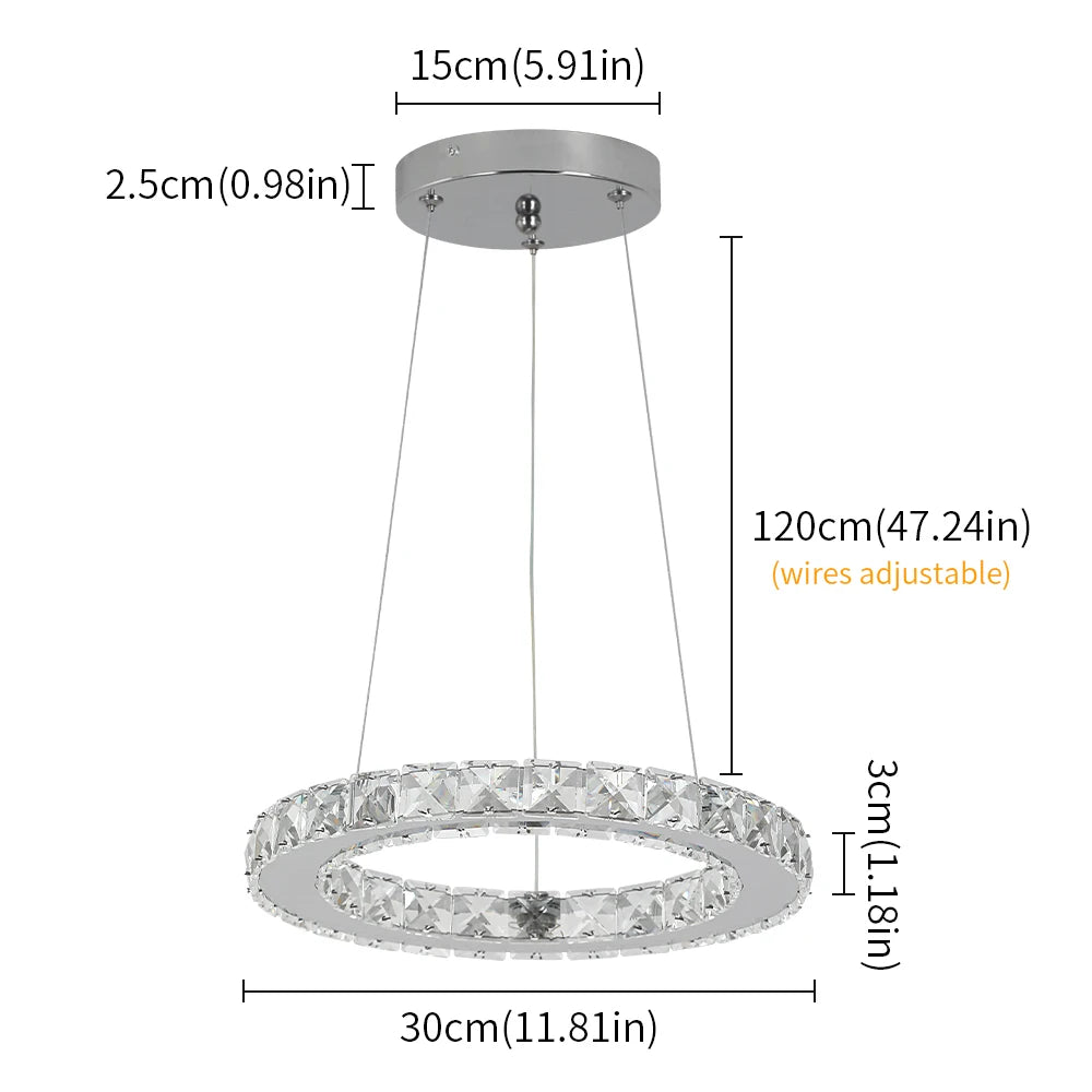 Luxury crystal ring LED chandelier suspended above a modern dining table in an elegant contemporary home.