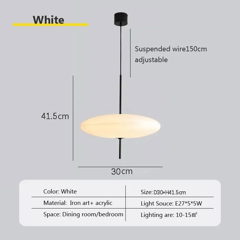 Nordic flying saucer LED pendant light hanging in a modern living room with minimalist décor.