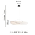 Nordic modern LED pendant light hanging above a dining table in a contemporary living room.