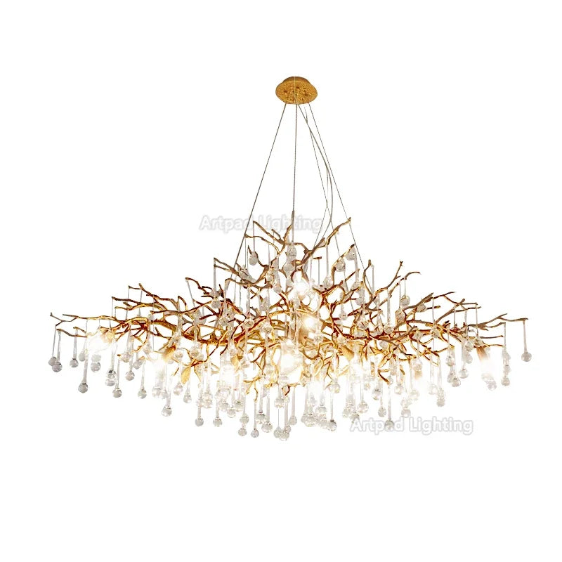 Luxury gold branch crystal chandelier hanging in a modern living room with elegant contemporary décor.