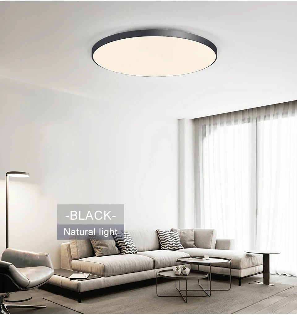 Smart dimmable LED ceiling light with remote control installed in a modern bedroom.