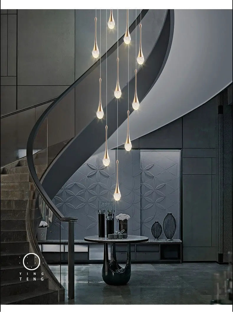 Modern bubble crystal pendant light hanging above a kitchen island in a luxury contemporary home.