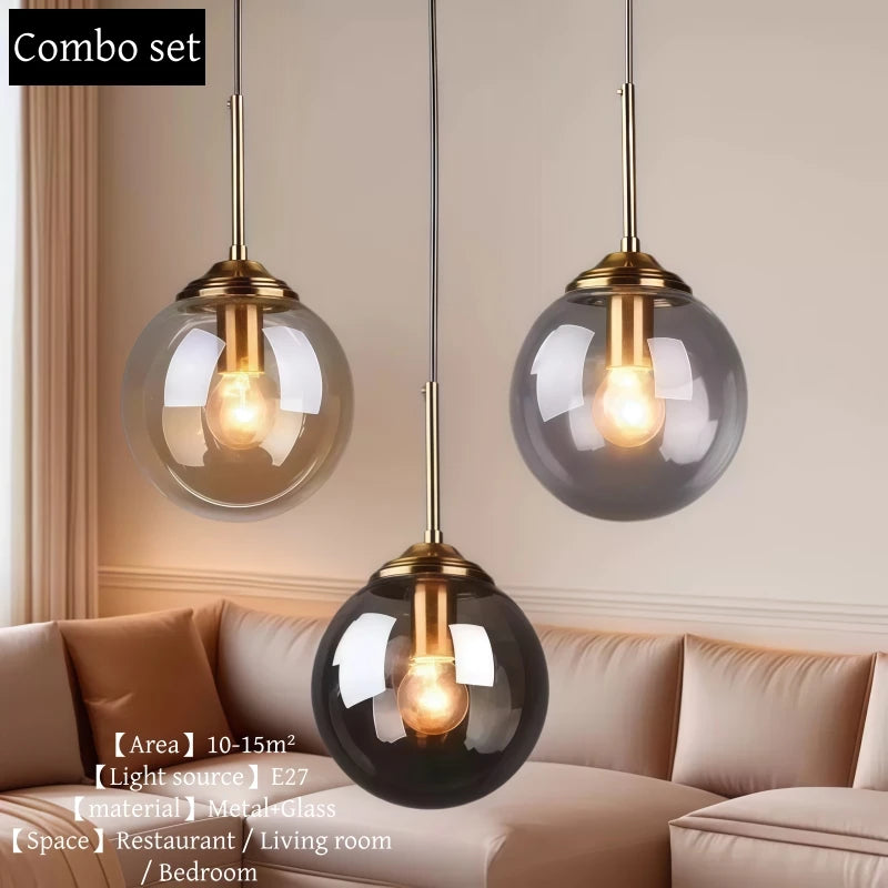 Modern luxury glass LED pendant light hanging above a dining table in a contemporary home.