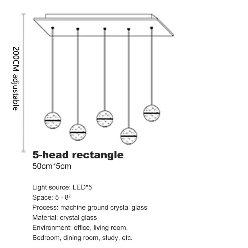 Modern spiral crystal LED chandelier cascading down a luxury staircase in a contemporary home.