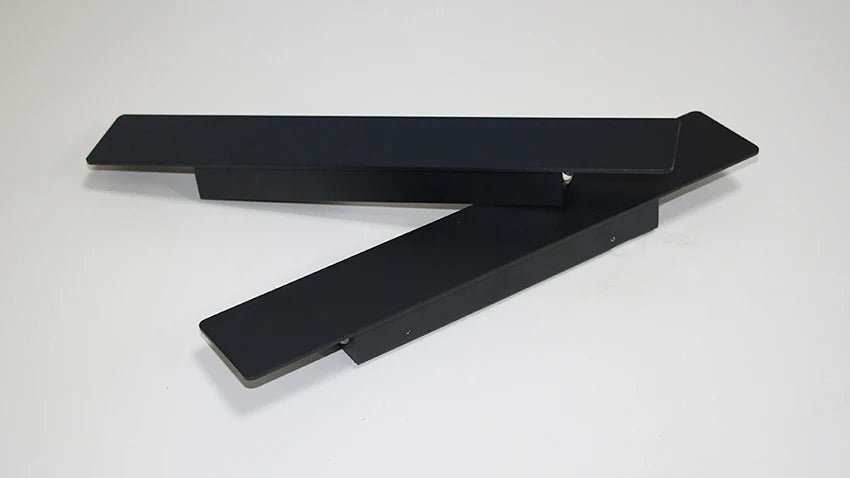 Modern black aluminum IP65 waterproof LED wall light mounted on an exterior wall with an up-and-down lighting effect.