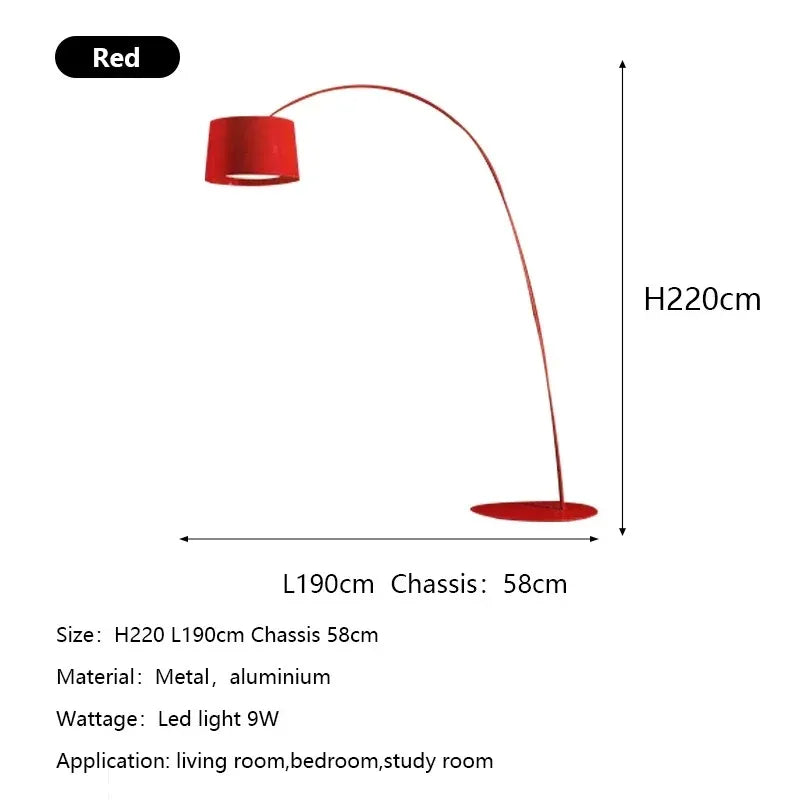 Nordic minimalist arc floor lamp beside a modern sofa in a Scandinavian-inspired living room.