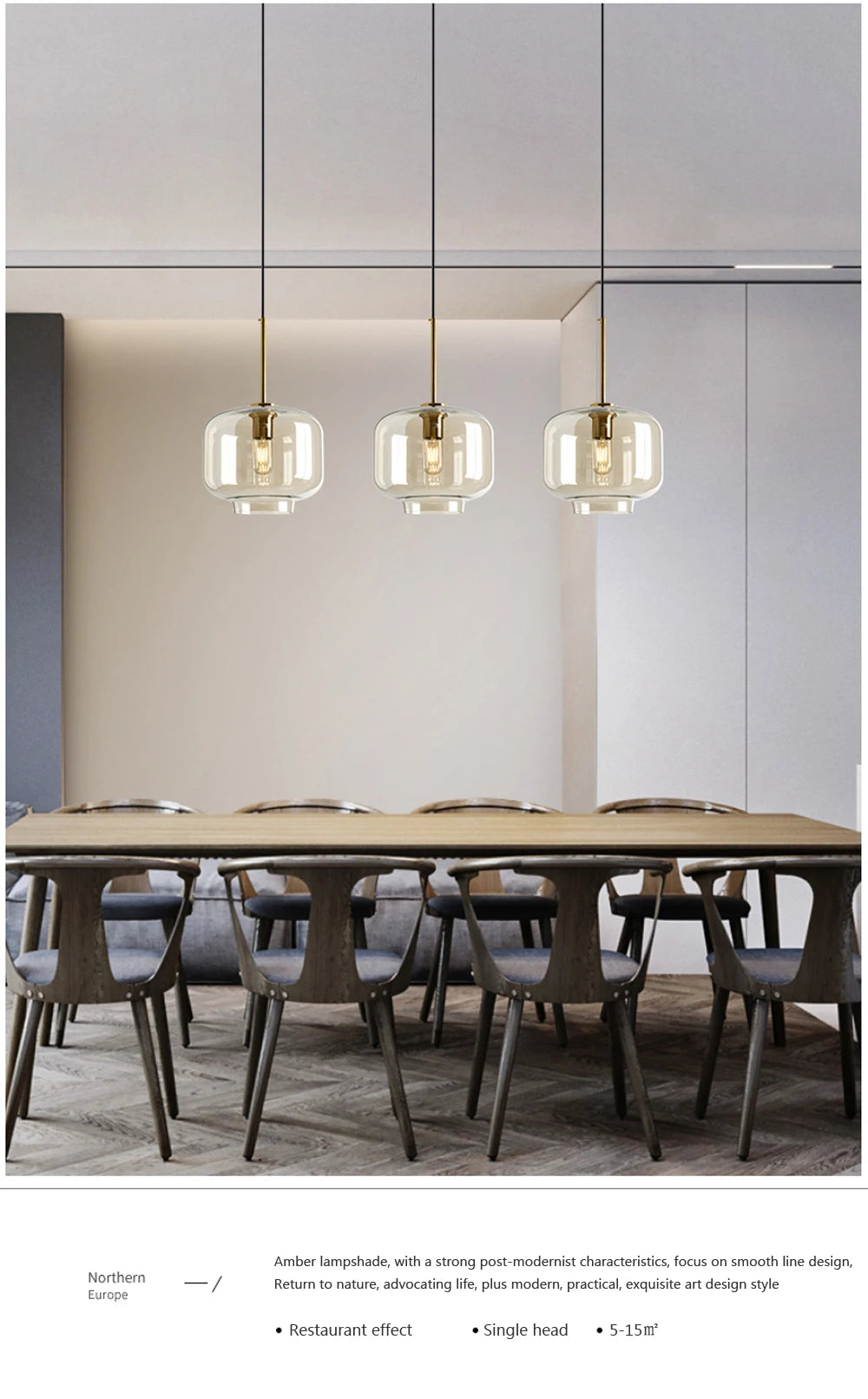 Nordic glass pendant light suspended above a kitchen island in a modern Scandinavian-inspired home.