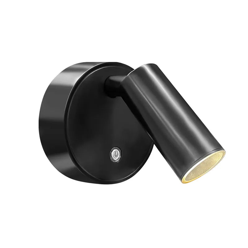 Magnetic rechargeable LED wall light mounted beside a bed with touch control and adjustable brightness.