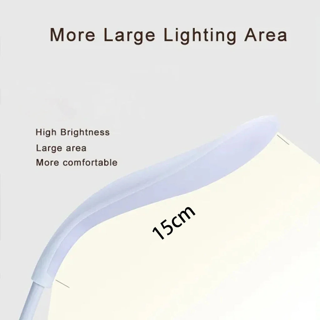Modern LED eye care desk lamp with USB charging and touch dimming on a study desk.