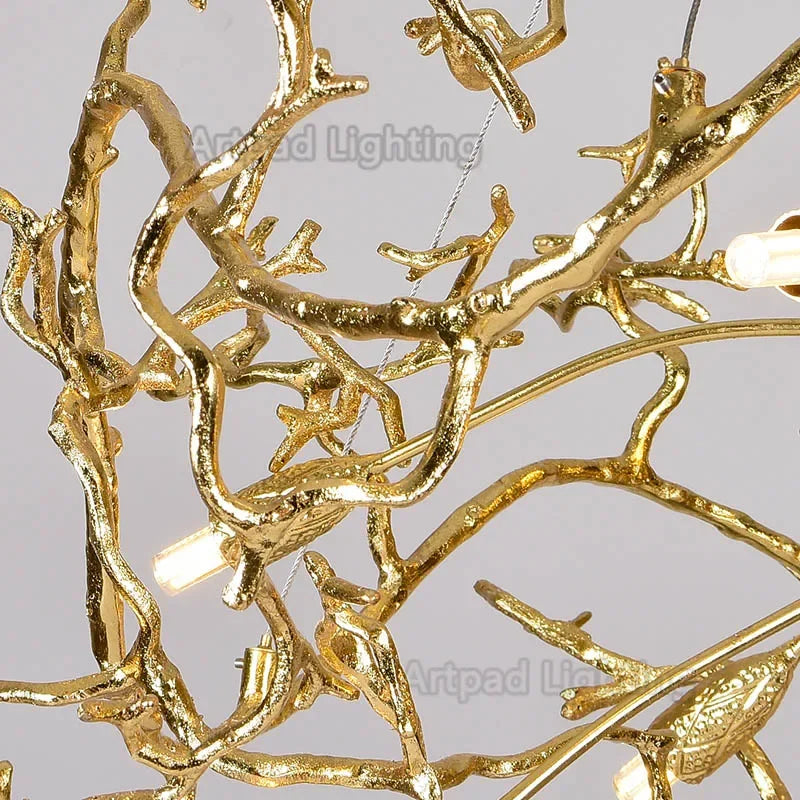 Luxury gold branch crystal chandelier hanging in a modern living room with elegant contemporary décor.