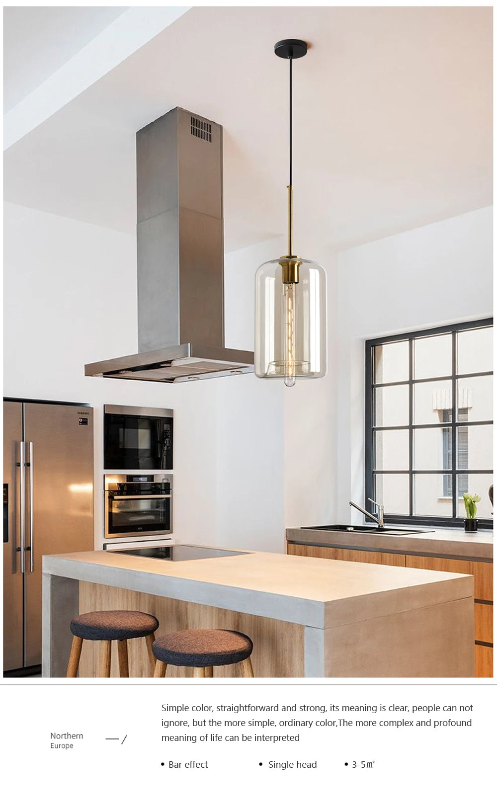 Nordic glass pendant light suspended above a kitchen island in a modern Scandinavian-inspired home.