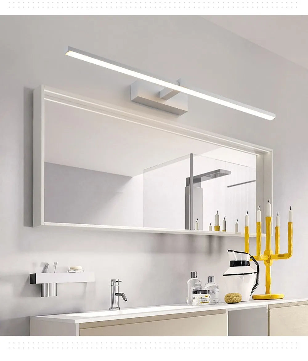 Modern waterproof LED mirror light mounted above a bathroom vanity mirror with bright, even illumination.