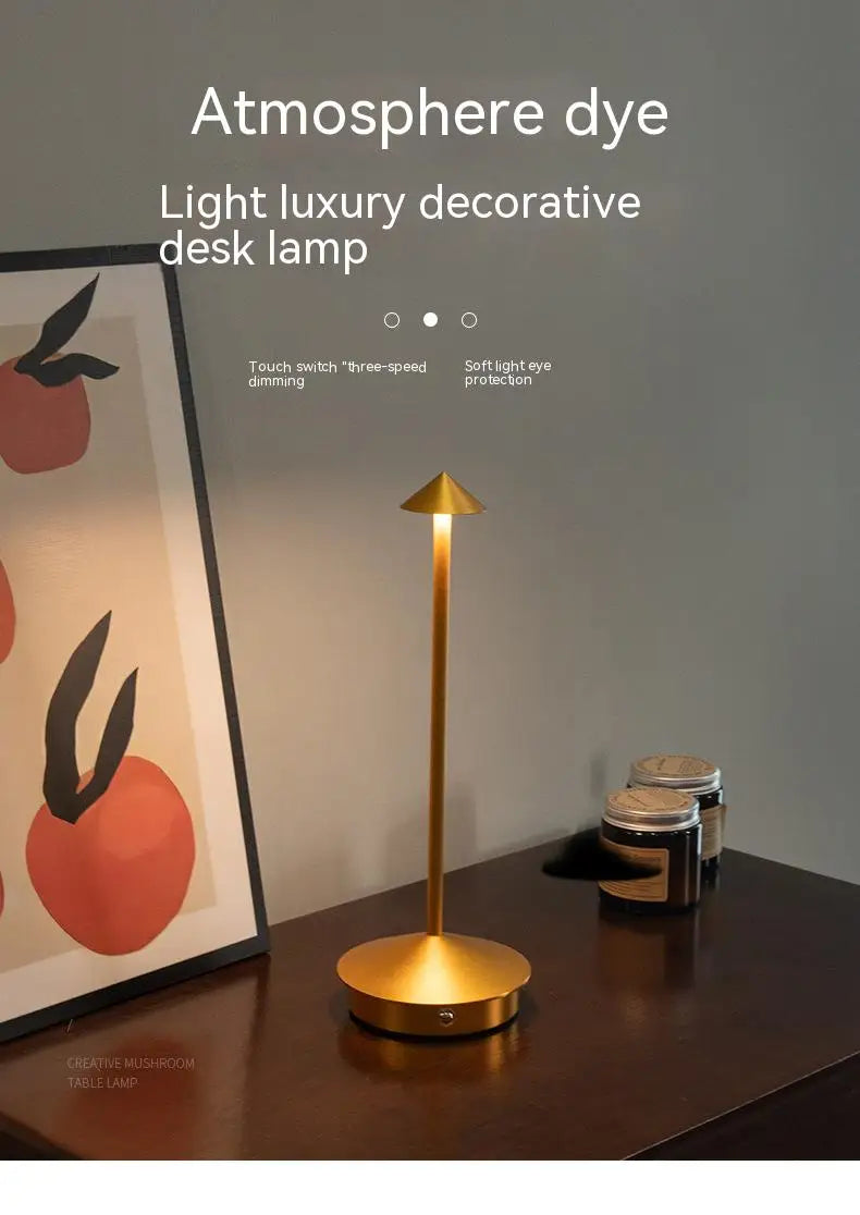 Rechargeable touch LED table lamp placed on a modern dining table in a stylish café-inspired interior.