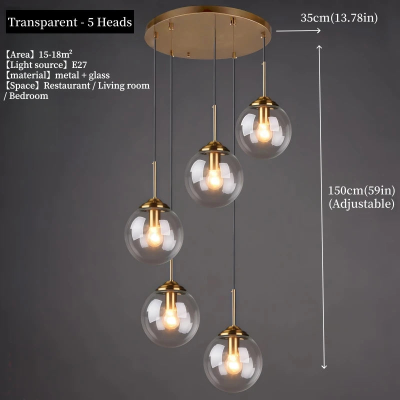 Modern luxury glass LED pendant light hanging above a dining table in a contemporary home.