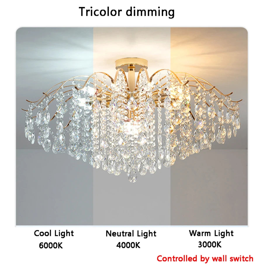 Modern luxury crystal LED chandelier installed in a stylish living room with elegant contemporary décor.