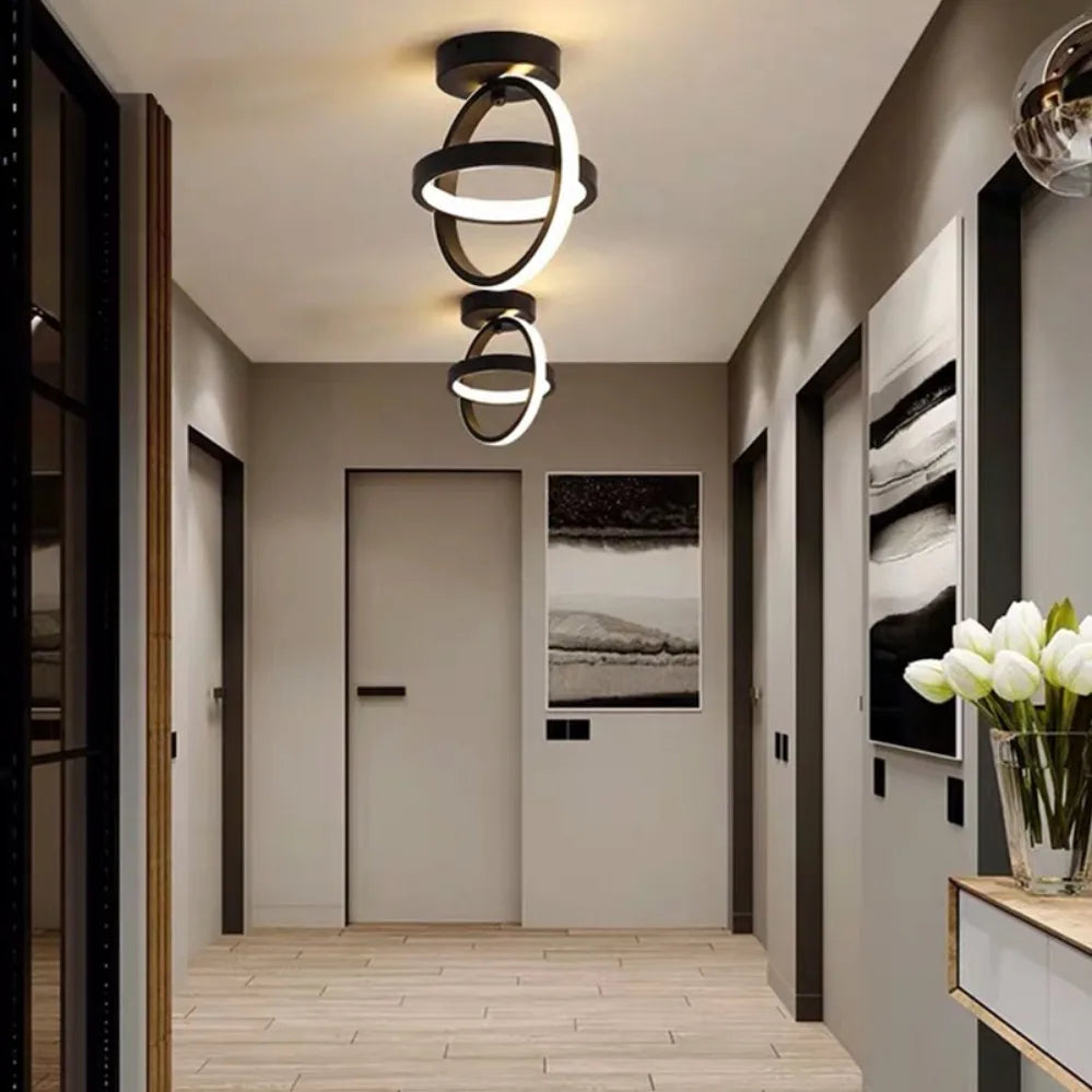 Modern 2 ring LED ceiling light installed in a stylish hallway with contemporary interior décor.