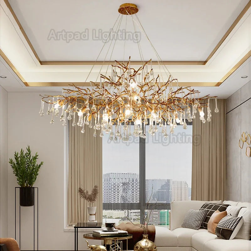 Luxury gold branch crystal chandelier hanging in a modern living room with elegant contemporary décor.