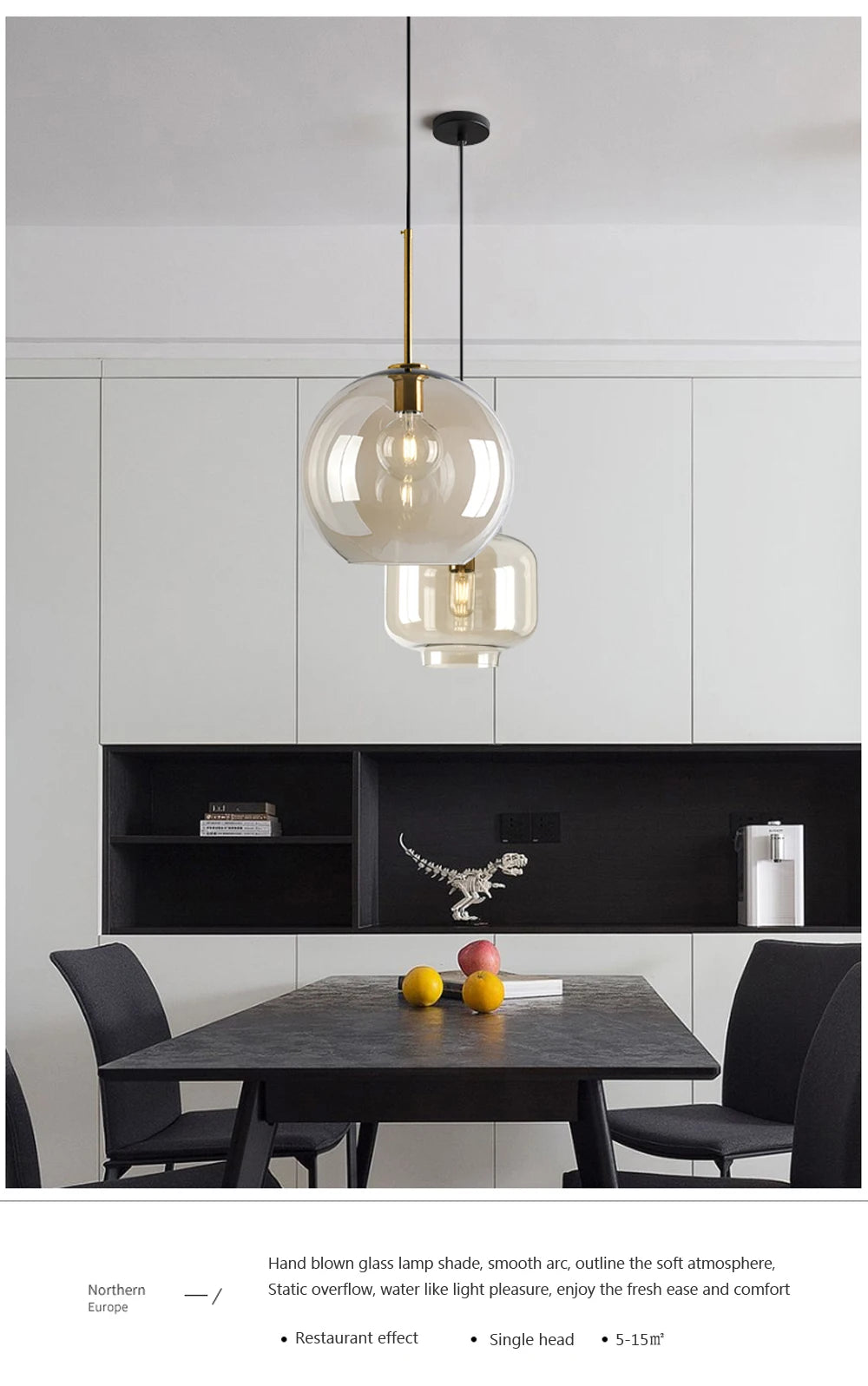 Nordic glass pendant light suspended above a kitchen island in a modern Scandinavian-inspired home.