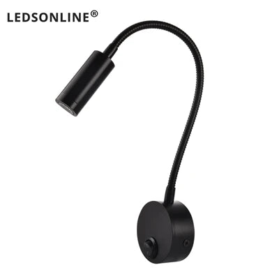 Modern LED wall reading light mounted beside a bed, providing focused lighting for reading.