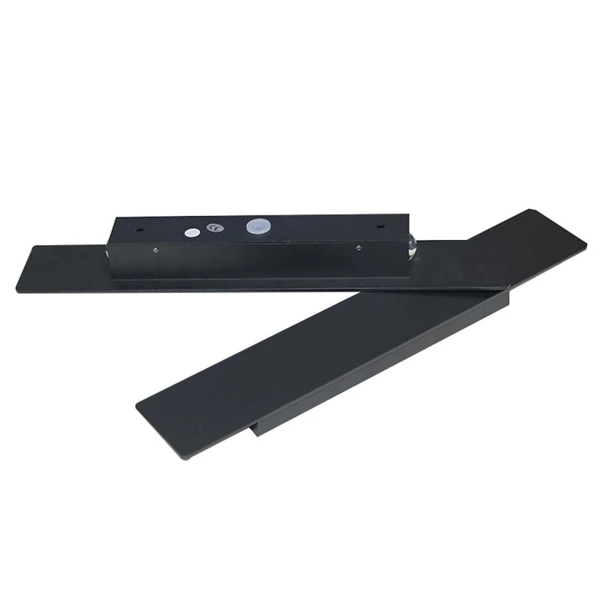 Modern black aluminum IP65 waterproof LED wall light mounted on an exterior wall with an up-and-down lighting effect.