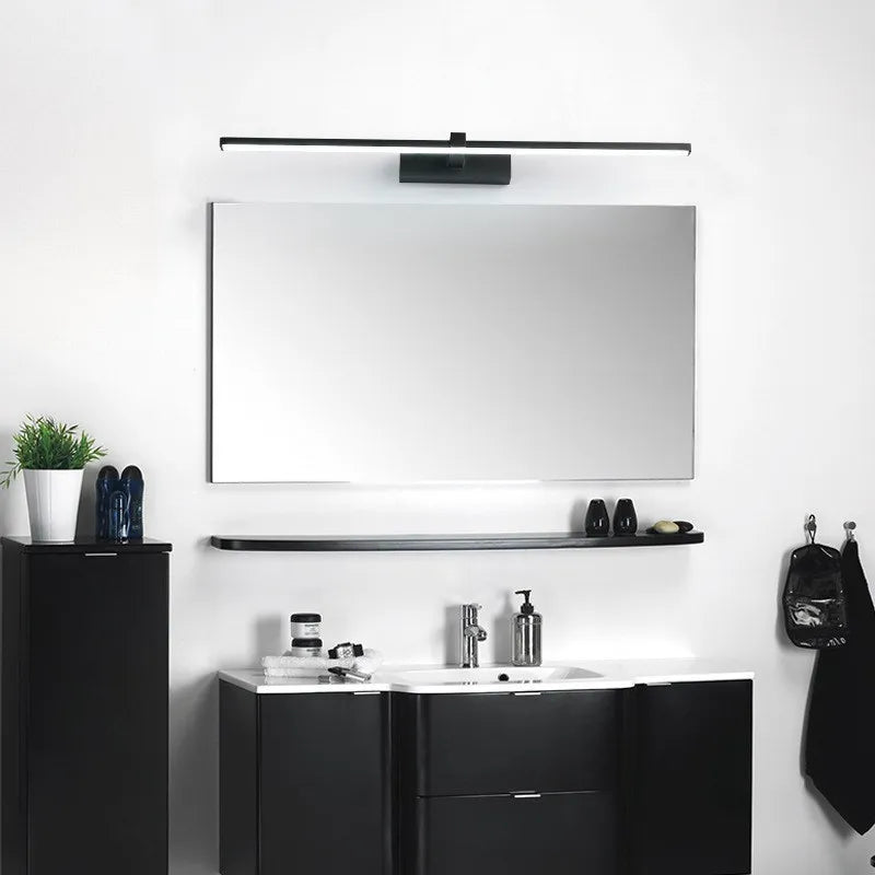Modern waterproof LED mirror light mounted above a bathroom vanity mirror with bright, even illumination.