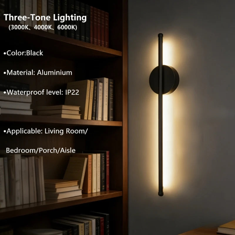 Wireless rechargeable LED wall sconce with remote control mounted beside a modern bedroom bed.