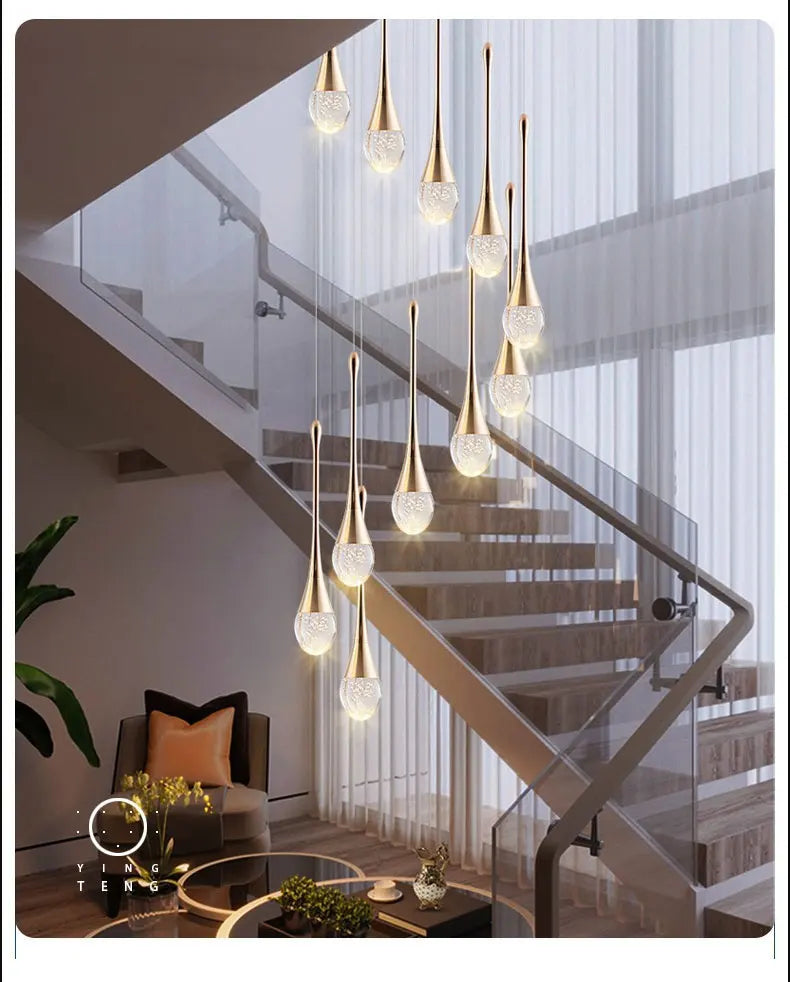 Modern bubble crystal pendant light hanging above a kitchen island in a luxury contemporary home.