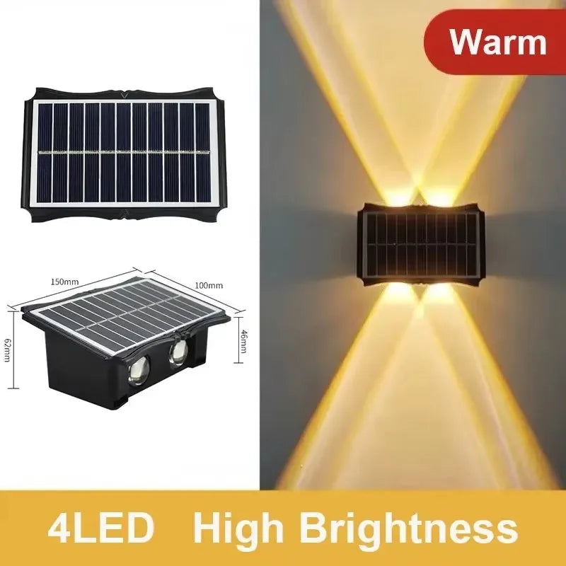 Modern waterproof solar LED wall light installed on an exterior wall illuminating a garden pathway.