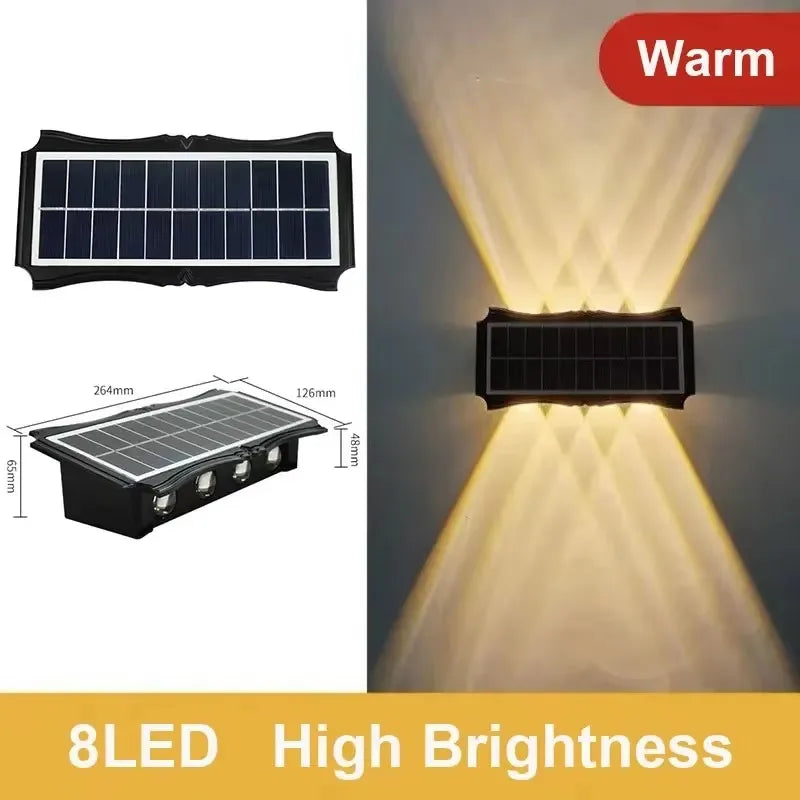 Modern waterproof solar LED wall light installed on an exterior wall illuminating a garden pathway.