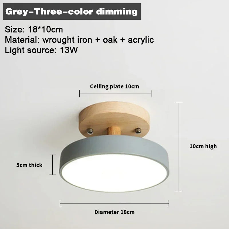 Nordic wood round LED ceiling light installed in a modern hallway with Scandinavian-inspired interior décor.