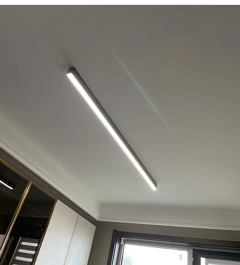 Nordic modern LED ceiling light installed in a contemporary living room with minimalist interior décor.
