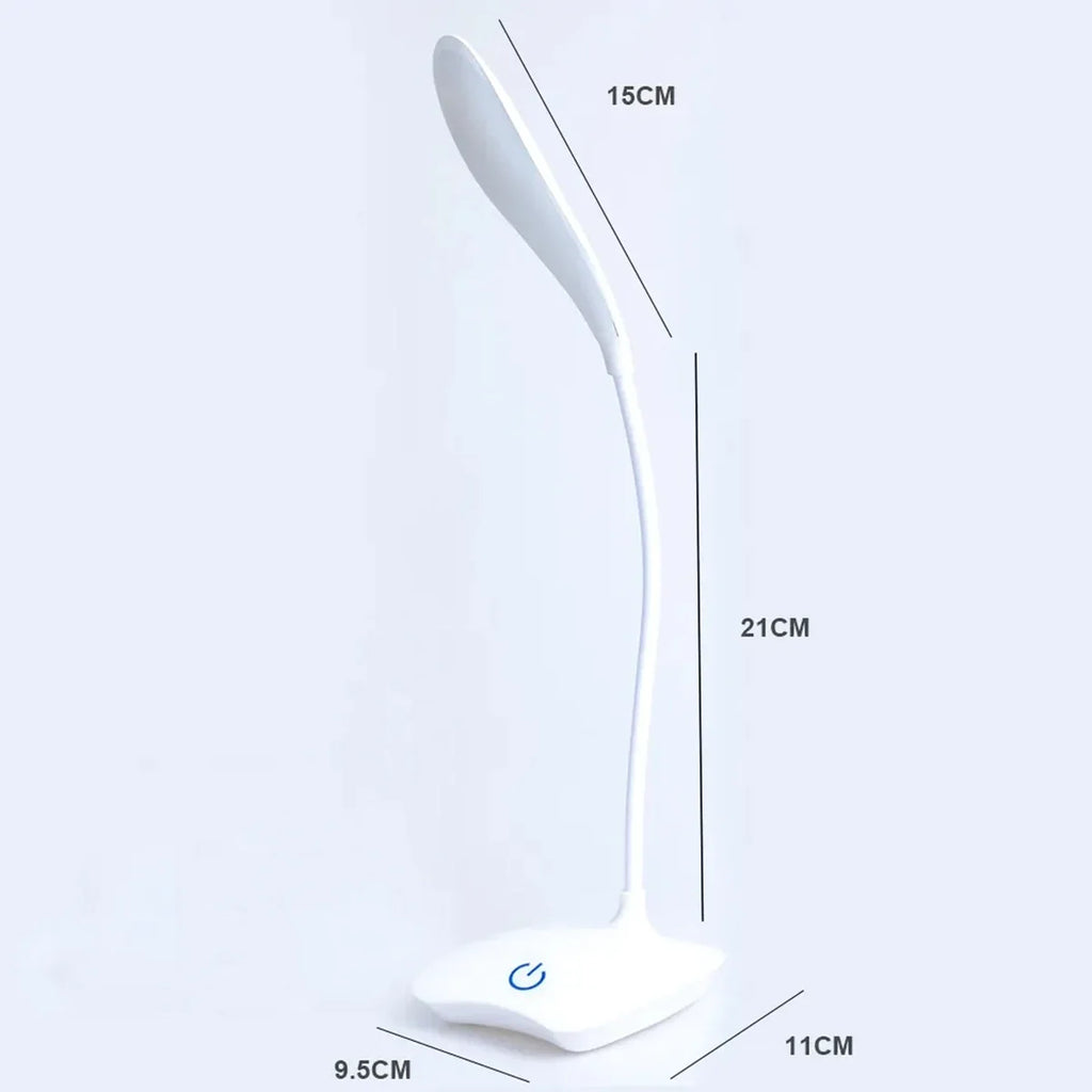 Modern LED eye care desk lamp with USB charging and touch dimming on a study desk.