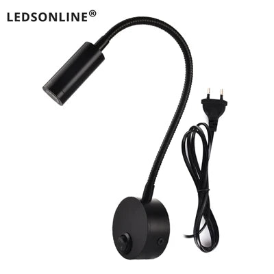 Modern LED wall reading light mounted beside a bed, providing focused lighting for reading.