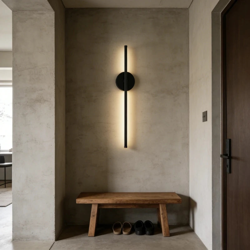 Wireless rechargeable LED wall sconce with remote control mounted beside a modern bedroom bed.